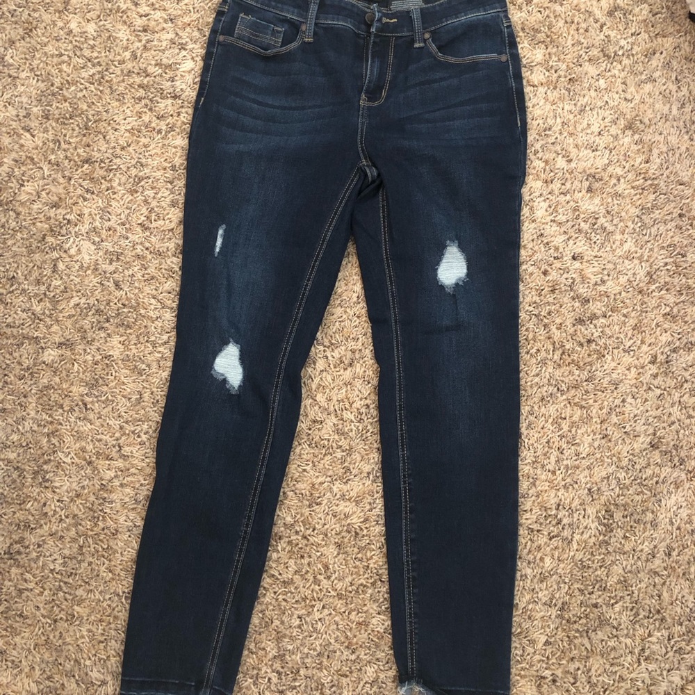 Slightly ripped jeans